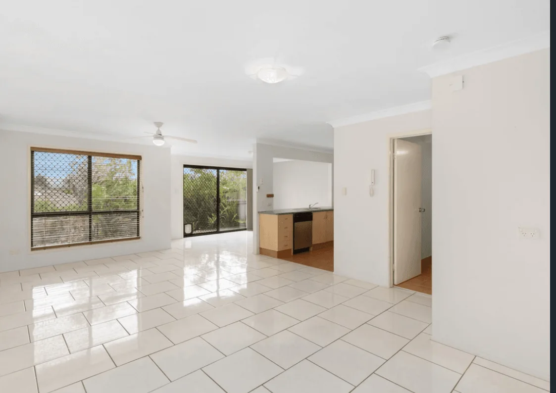 Vacant open plan apartment before property styling